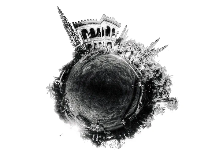Lost in the grayscale.  This tiny planet is a captivating journey through a world of shadows and light.  A tiny world, a big story.