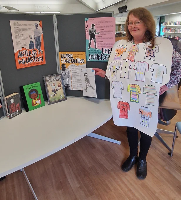 woman with shirt designs and display
