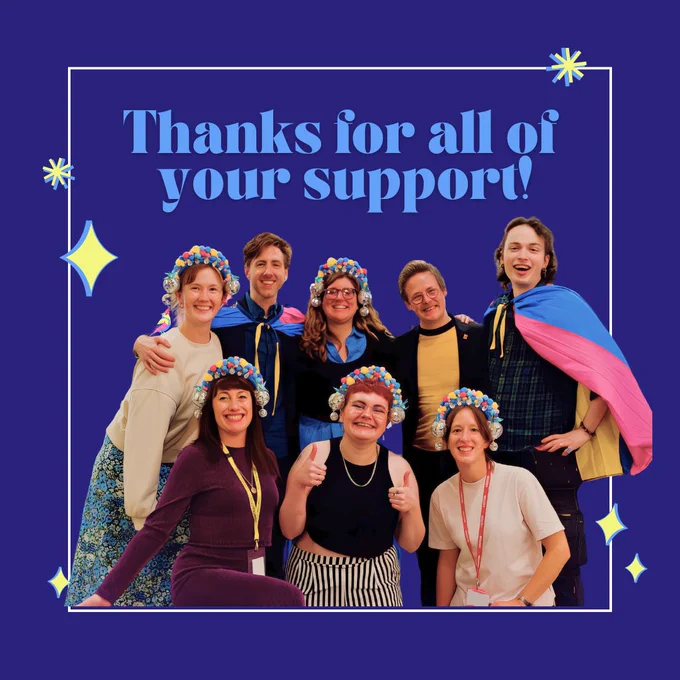 Text reads: "Thanks for all of your support!". Below the text is a cut-out photo of a group of people in colourful outfits, posing together and smiling at the camera.