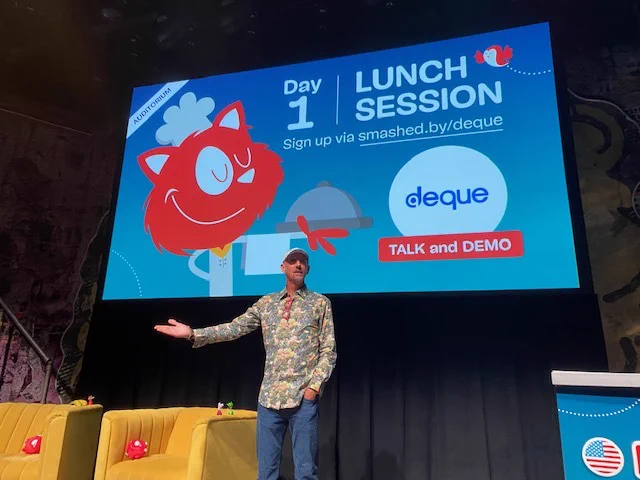 Dylan from Deque on stage before his lunch session