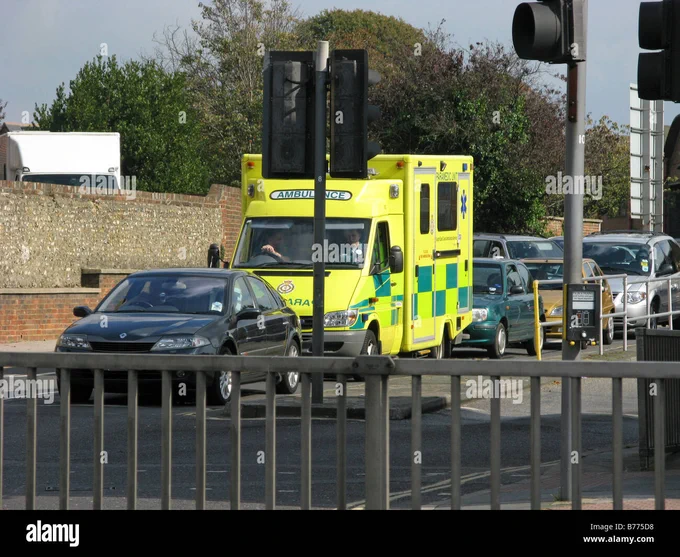 Stock image of ambulance in traffic