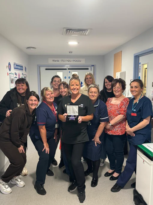 Matron receiving an award
