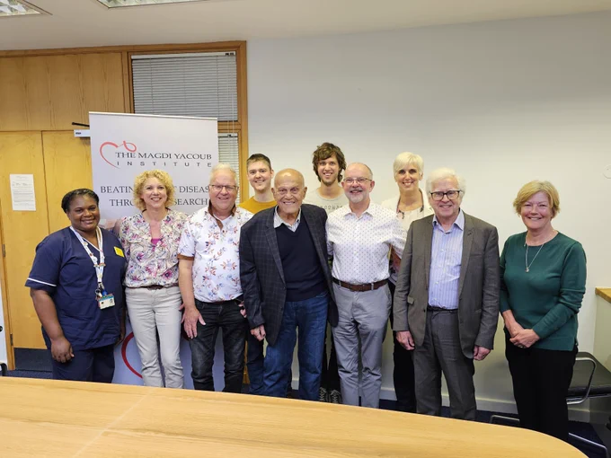 A group photo from the reunion. From left to right: Hilary Sharp (senior sister, transplant outpatients), Petra (Bert's wife), Bert, Guido (Bert's son), Professor Sir Magdi Yacoub, Ivo (Bert's son), Clive, Nicola (Clive's wife), Dr Andrew Mitchell and Rita Presnail.