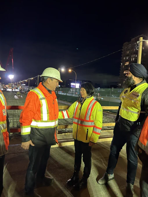 Mayor Olivia Chow and Minister Prabmeet Sarkaria with some of the Gardiner reconstruction team.