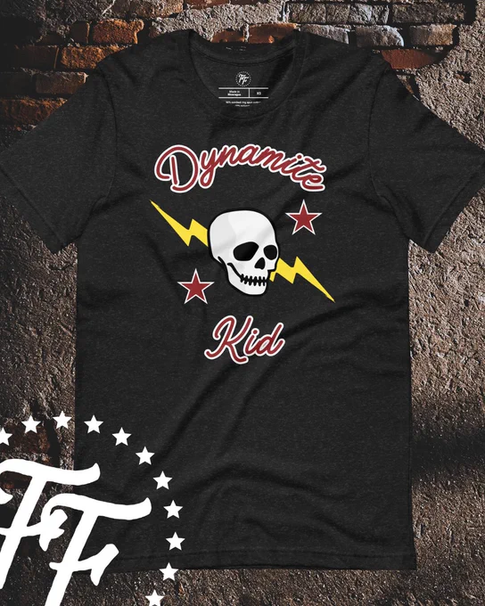 This shirt is inspired by the ring vest worn by the Dynamite Kid during his time in various promotions outside of the WWF. Including his time in the Pacific Northwest, Stampede Wrestling and All Japan.

He wore this vest during his title run as the NWA Pacific Northwest Heavyweight Champion in 1983 as well as during his final run in Stampede wrestling in 88-89, and All Japan through the early 90's.

Dynamite Kid Collection: https://fightersfirst.shop/collections/dynamite-kid