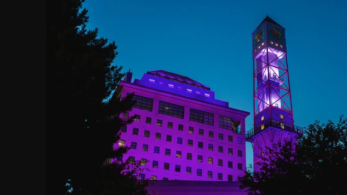 Clock Tower lit purple.