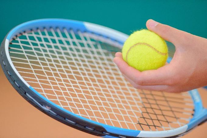 Tennis racket and ball