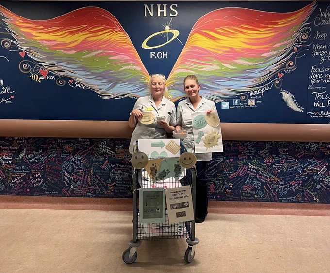 Work related stress educational update by two midwives features here with educational resource trolley