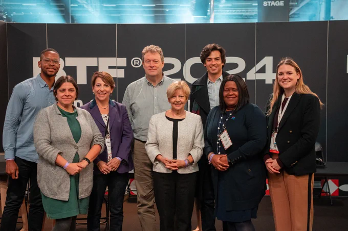 Minister Jones and Ashley Ainsley in a group photo with others at Black Tech Fest