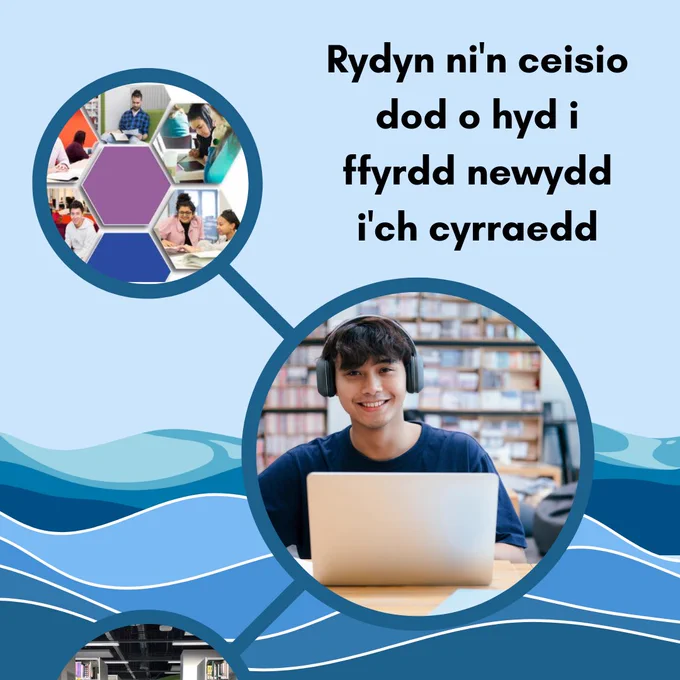 Male student with laptop in library