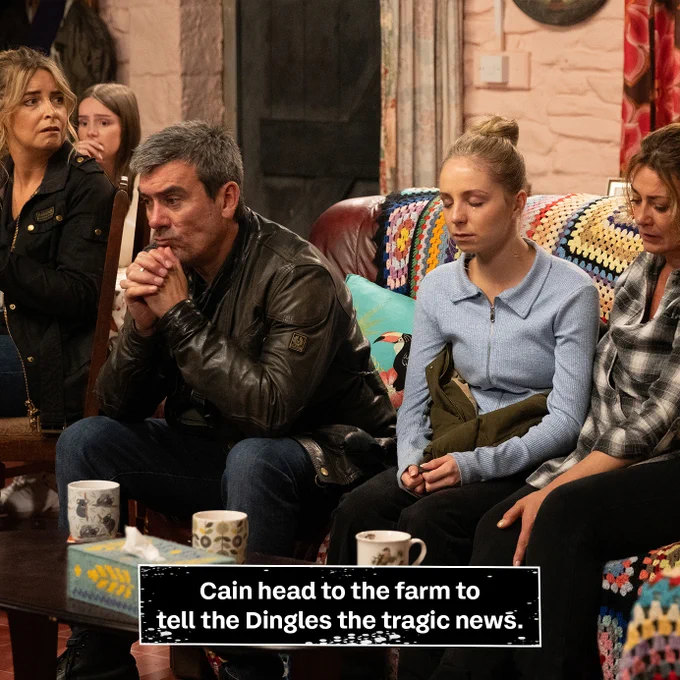 The Dingles look upset. Belle is crying. Title reads: Cain heads to the farm to tell the Dingle the tragic news.