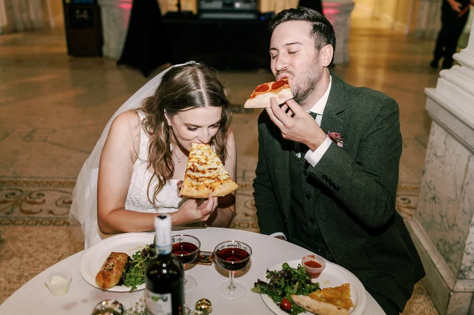 A bride and Groom enjoying Ian's Pizza!