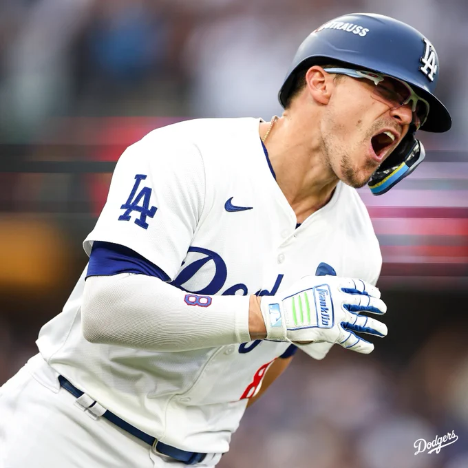 Kiké Hernández yells after hitting a home run.