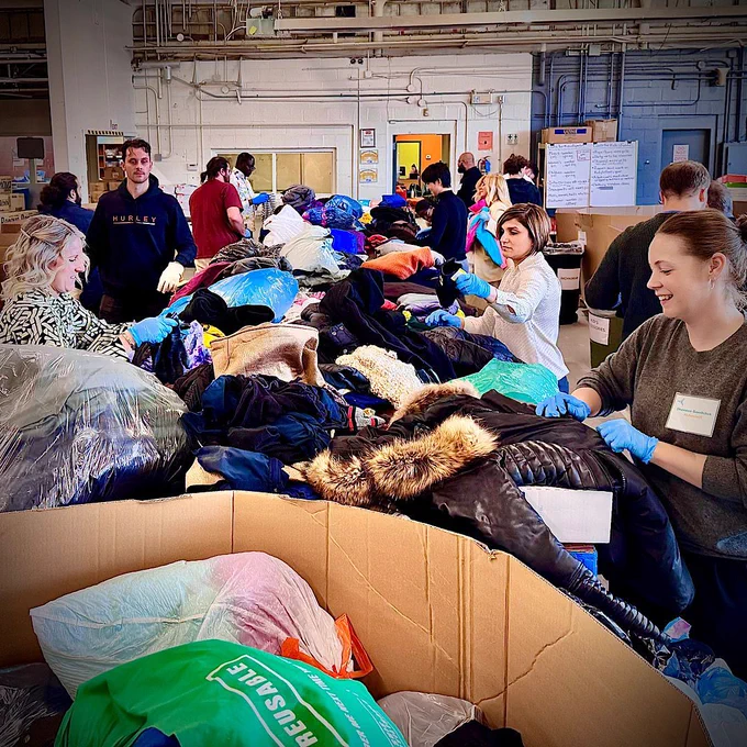 Sorting coats at United way 