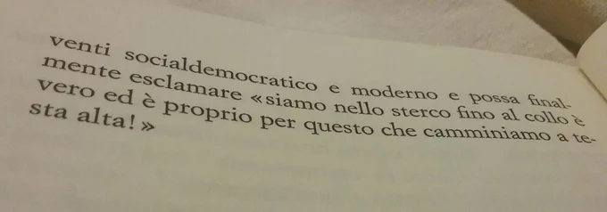 Picture of the closing lines to Dario Fo's play in Italian original: « siamo nello sterco fino al collo è vero ed è proprio per questo che camminiamo a testa alta ❗️»
