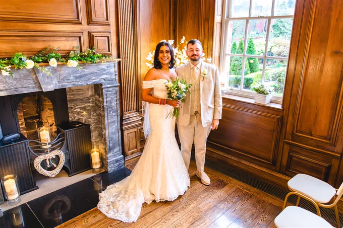 Jessi Bhatia and Michael Johnson tie the knot in a ceremony conducted by Wolverhampton’s Superintendent Registrar, Toby Dignum.