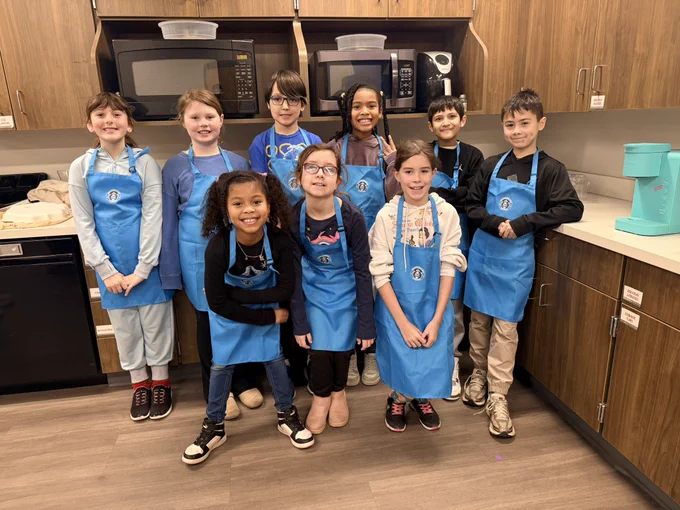 Students working at Sharkbucks Coffee Shop