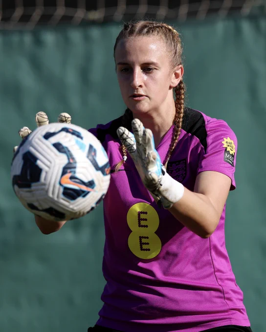 Katie Christopher catches a ball during a training drill