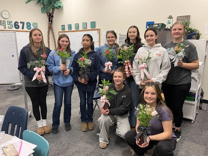 FFA members making flower arrangements.