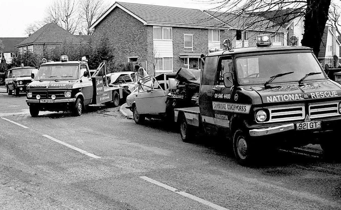 2 Bedford CF recovery trucks in a residential street. May be in Surbiton or New Malden. 