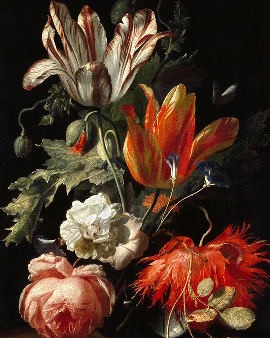 A still life of a vase of vibrant flowers