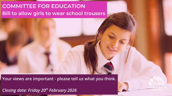 Image of a teenage girl leaning over a desk writing. She is wearing a white shirt with a red, black and white tie. In the background you can see other pupils at desks blurred out. Above the image there is text which reads: 'Committee for Education: Bill to allow girls to wear school trousers'. Below the image it reads: 'Your views are important - please tell us what you think. Closing date: Friday 20th February 2026.