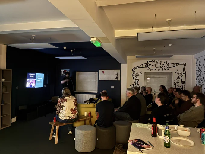 Chris presenting, view from side of audience