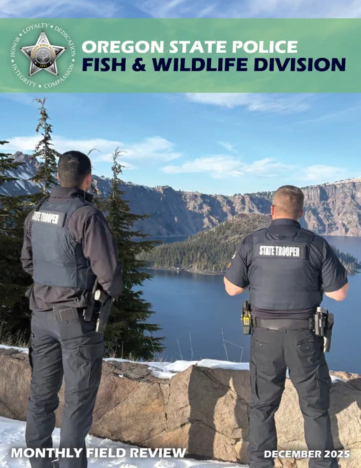 Two OSP Troopers stand facing away from the camera, viewing Crater Lake in the background. Overlay text at the top reads "Oregon State Police Fish & Wildlife Division" and text at the bottom reads "Monthly Field Review, December 2025."