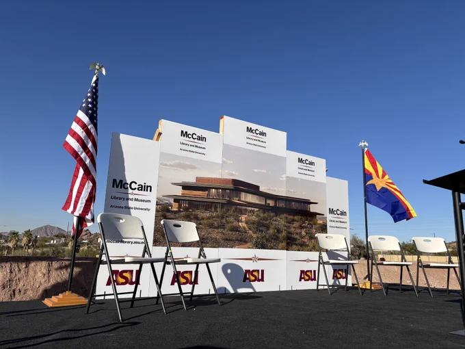 A view of the stage and building rendering during a groundbreaking ceremony for the McCain Library and Museum in Tempe.