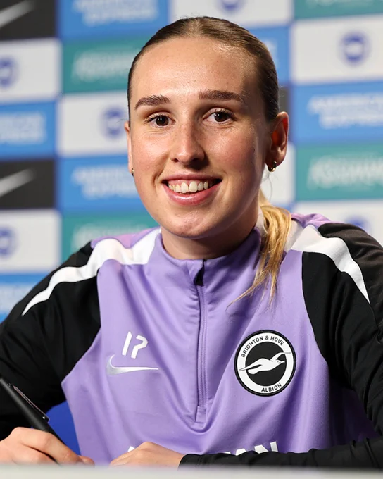 Bex Rayner signing her new contract for the Albion.
