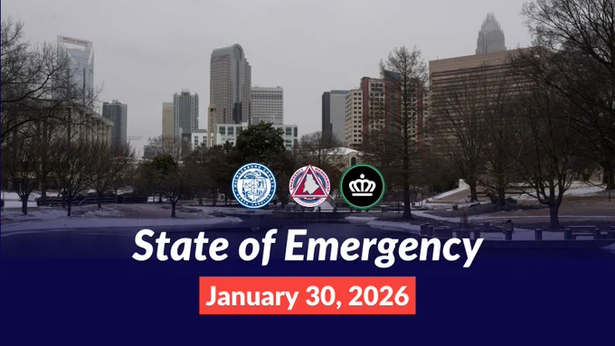 Charlotte city skyline on a snow day at a park. Logos of Mecklenburg County, Charlotte-Mecklenburg Emergency Management and City of Charlotte are displayed. Text reads: "State of Emergency, January 30, 2026."