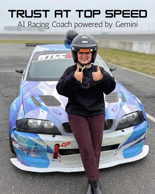 A smiling person wearing a black racing helmet, a black long-sleeved shirt with a shiny "8," and dark red pants stands in front of a blue and white patterned race car on a track, giving two thumbs up. Text overlaying the image reads "TRUST AT TOP SPEED" and "AI Racing Coach powered by Gemini." The car's windshield displays "WTCC."
