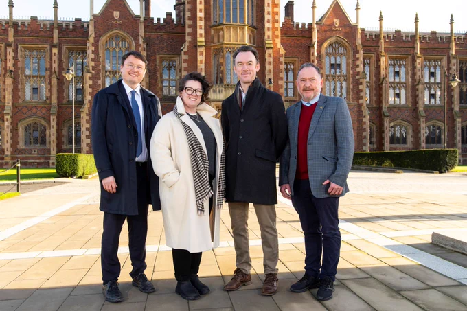Image shows four people standing at the front of the Lanyon Building at Queen's University Belfast. They are, from left to right, Dr Philip Wales, Co-Director of Administrative Data Research NI (ADR NI) and Chief Executive of Northern Ireland Statistics and Research Agency (NISRA); Dr Aideen Maguire, Co-Director of ADR NI from Queen's University Belfast; Professor Jamie Murphy, Deputy Director of ADR NI from Ulster University; and Professor Archie Clements, Pro-Vice-Chancellor for Research and Enterprise at Queen's University Belfast.