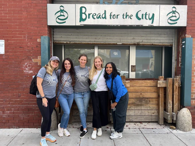 The CleanChoice Energy team standing outside of Bread for the City in Washington, DC