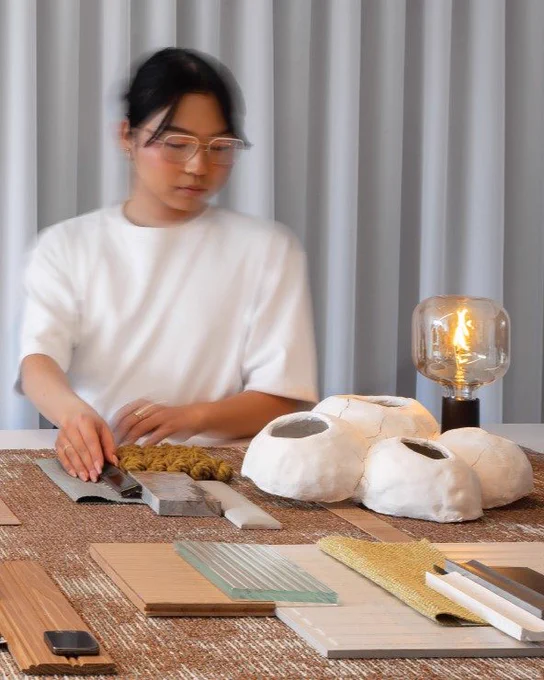 A woman creating art at the DesignTO festival. 