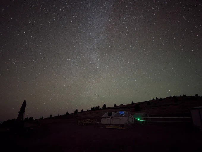 The MROI telescopes and sky at night.

