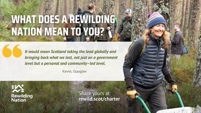 A smiling woman in outdoor gear pushes a wheelbarrow through a woodland, while a small group of people with backpacks and tools stand in the background. The text overlay reads, "WHAT DOES A REWILDING NATION MEAN TO YOU?" followed by a quote from Kevin in Glasgow: "It would mean Scotland taking the lead globally and bringing back what we lost, not just on a government level but a personal and community-led level". The image promotes rewild.scot/charter.