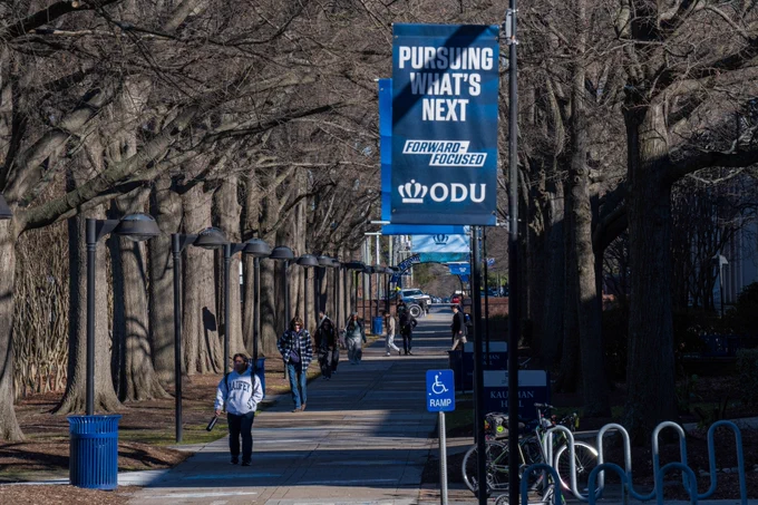Students walking on sidewalk
