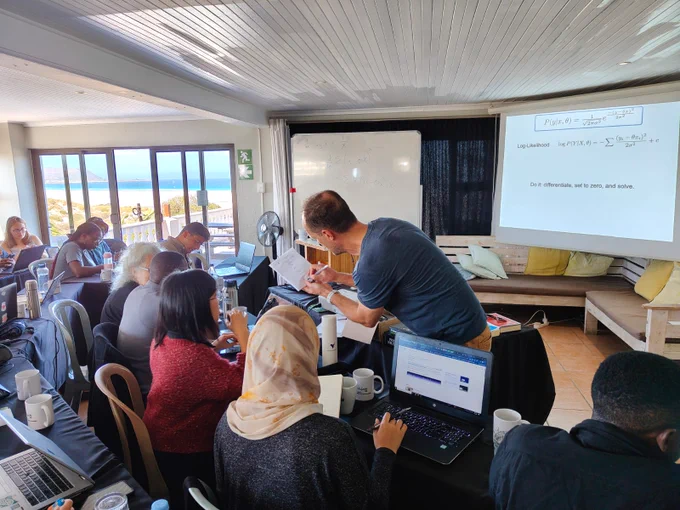 Prof. Jonathan Pillow from Princeton University is helping students to solve MLE equations.