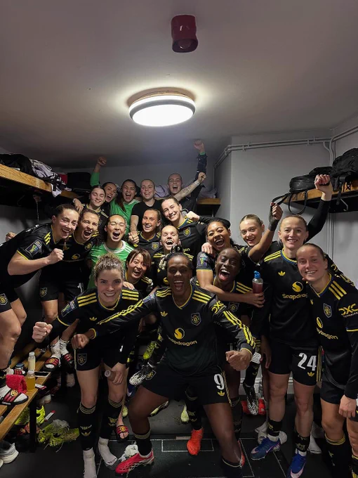 United celebrate reaching our maiden League Cup final in the dressing room.