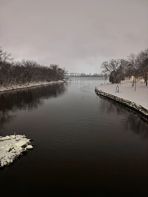 A winter night with snow over the River 