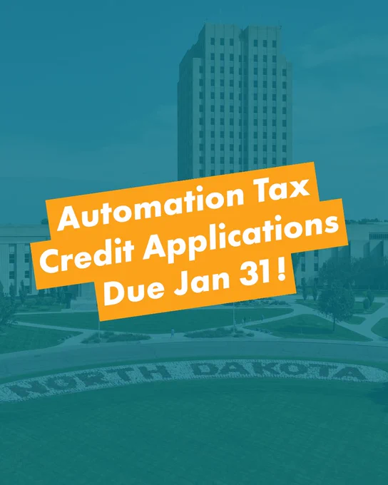 A vertical graphic with a teal-tinted background image of the North Dakota State Capitol building in Bismarck. Overlaid in the center is a bright orange, slanted banner with white text that reads, "Automation Tax Credit Applications Due Jan 31!". In the foreground, the words "NORTH DAKOTA" are spell