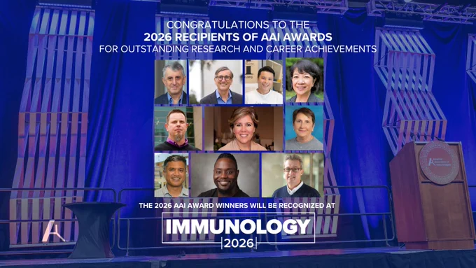 Stage backdrop displaying congratulations to the 2026 AAI Award recipients, featuring portraits of the winners and event details.