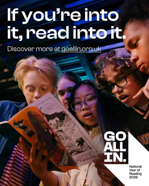 Young people gathered close together and looking at a graphic novel. 

Text at the top reads: 'If you're into it, read into it. Discover more at goallin.org.uk

Go All In / National Year of Reading 2026 logo appears bottom right.