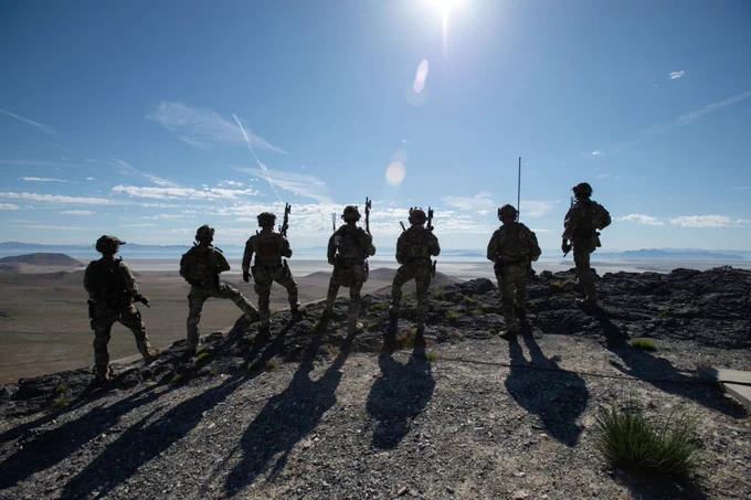 U.S. Army service members of the 19th Special Forces Group (Airborne), Utah National Guard, over look the area of operations during Exercise Hydra, May 8, 2025 at the Utah Test and Training Range, Utah. Exercise Hydra prepares our Total Force to respond decisively to the most complex threats of our time. From air superiority to SOF insertion, this exercise reinforces combat readiness across all domains. (Photo by U.S. Air Force Master Sgt. Danny Whitlock)\n\n