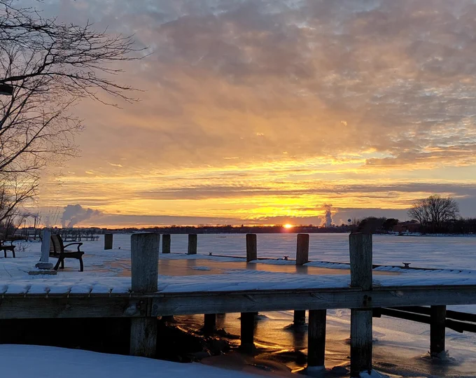 Sunset over the River off of a dock