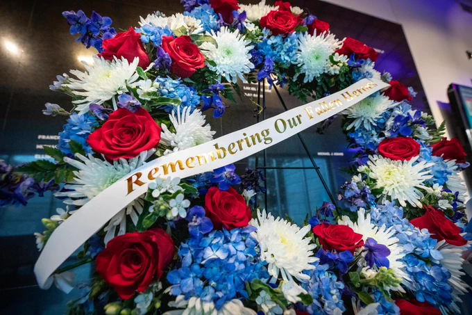 A memorial wreath inside the Kennedy Space Center Visitor Complex in Florida commemorates NASA\u2019s Day of Remembrance on Thursday, Jan. 23, 2025. The banner on the wreath reads: \"Remembering our fallen heroes.\" Credit: NASA/Cory Huston