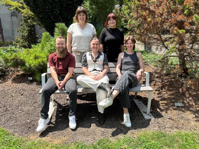 Photo of Dr. Sarah Beattie and research team outside in a garden