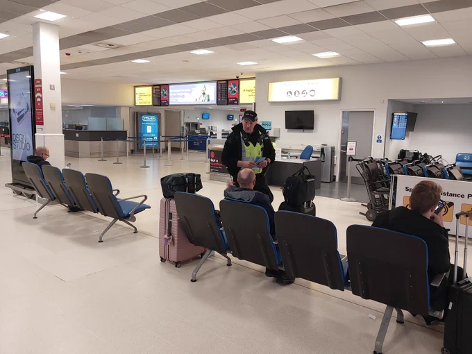Officer engaging with the public to promote the servator message
