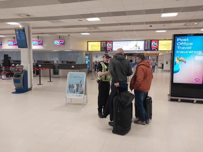 Officer engaging with the public to promote the servator message